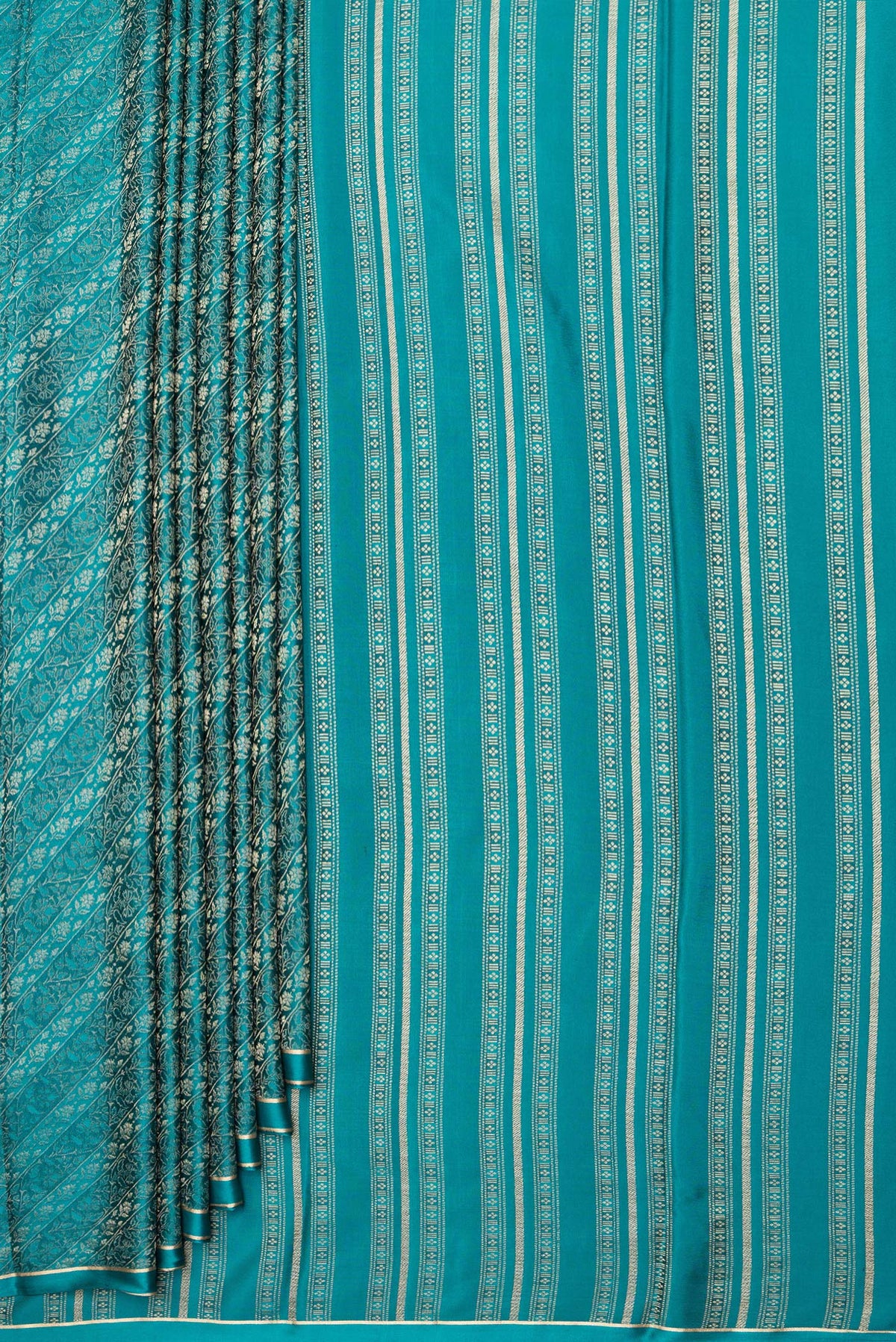 Pleats and pallu of Pure Silk Peacock Blue Dual Tone Banarasi Georgette Saree with Zari Brocade on the body and Zari Border. 