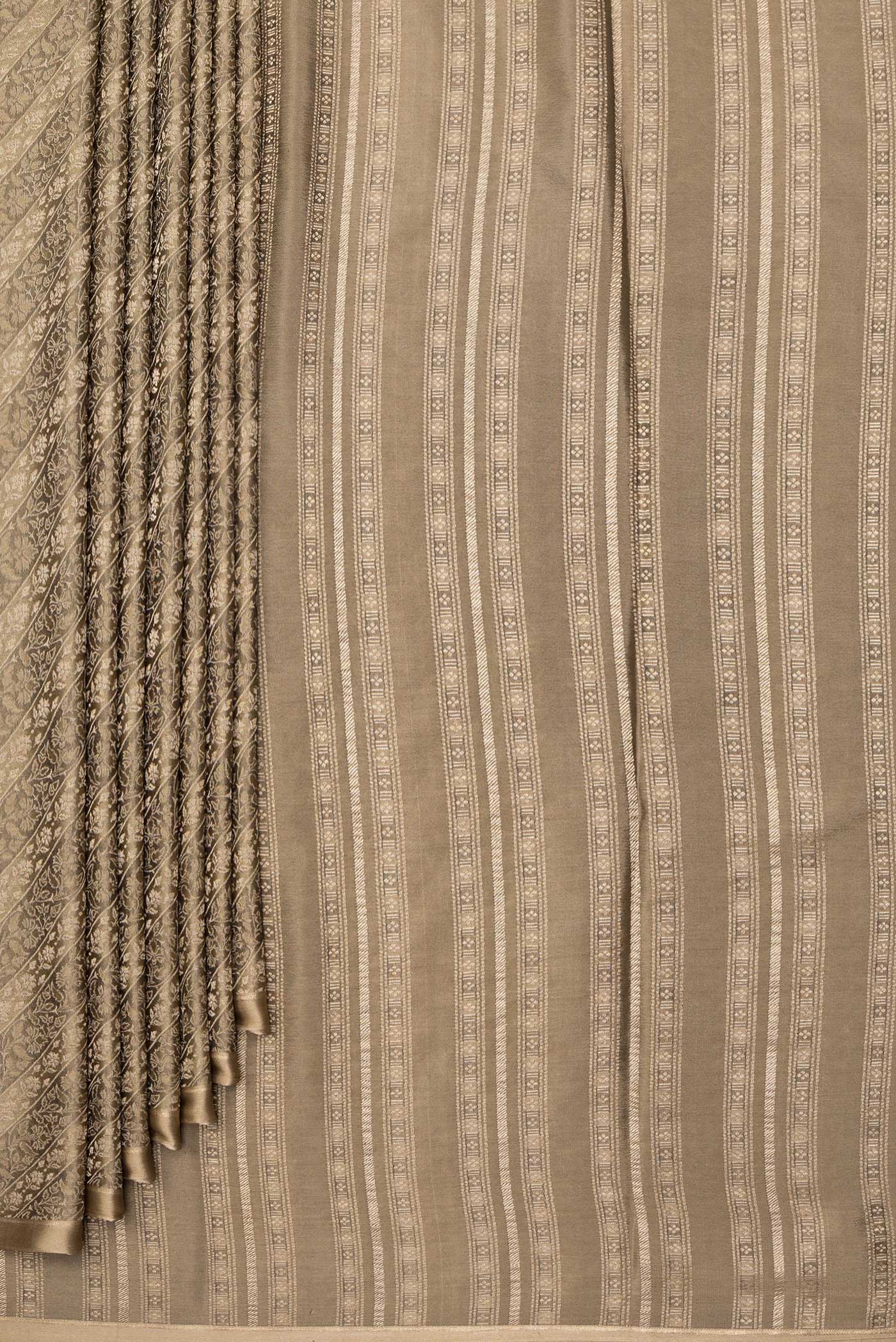 Pleats and pallu of Brown Dual Tone Banarasi Georgette Saree with Zari Brocade on the body and Zari Border. 
