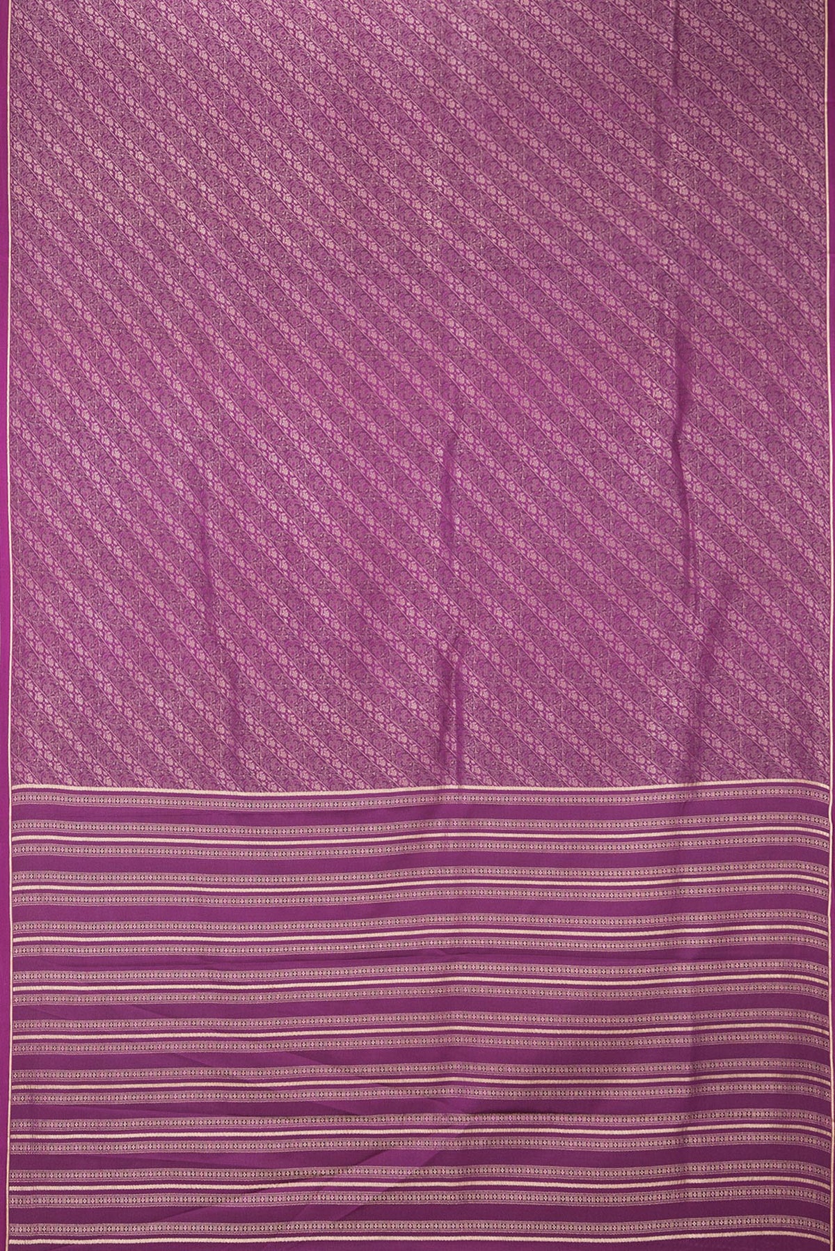 Flat view of Magenta Dual Tone Banarasi Georgette Saree with Zari Brocade on the body and Zari Border. 