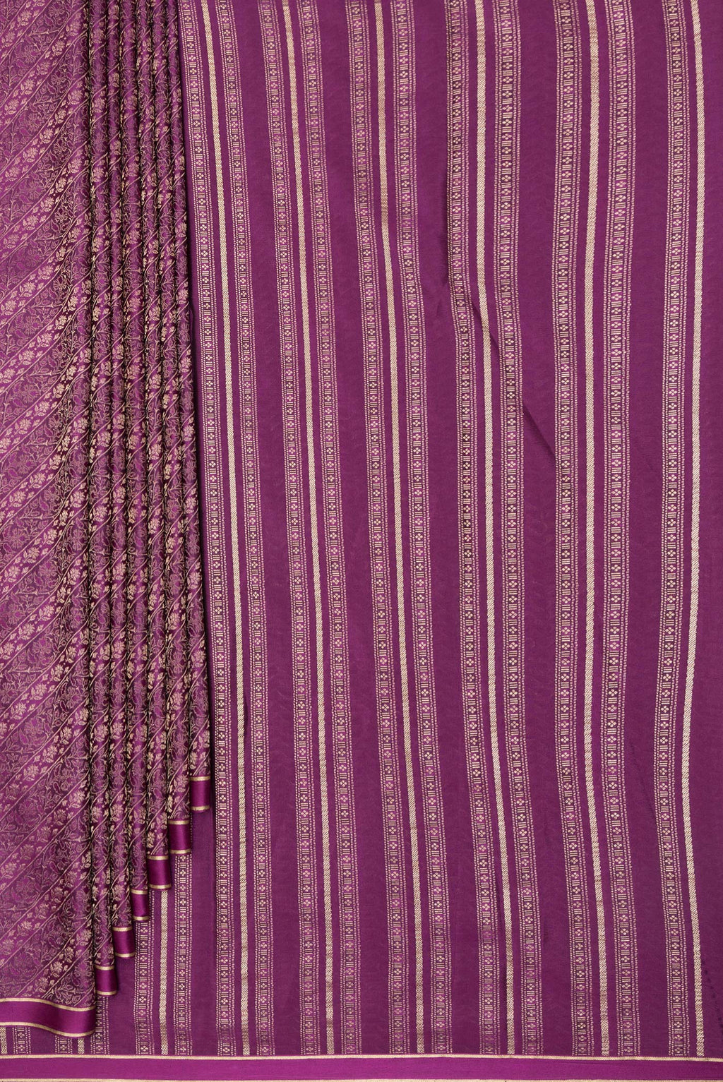 Pleats and pallu of Magenta Dual Tone Banarasi Georgette Saree with Zari Brocade on the body and Zari Border. 