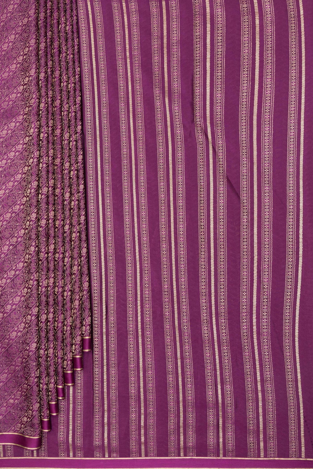 Pleats and pallu of Magenta Dual Tone Banarasi Georgette Saree with Zari Brocade on the body and Zari Border. 