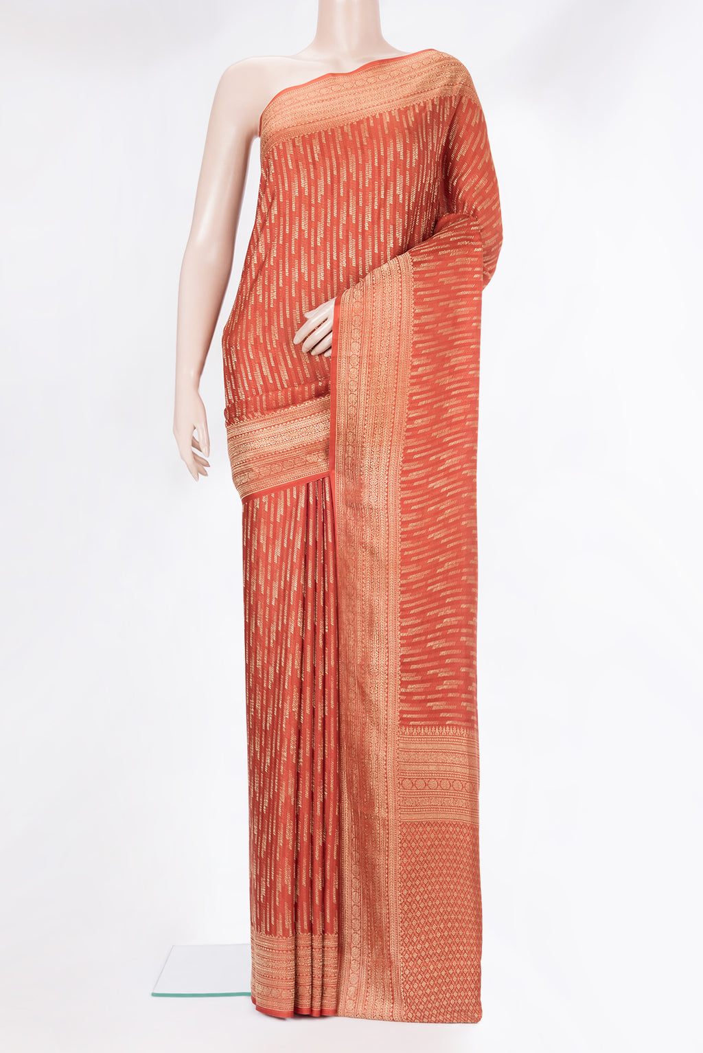 Rust Dual Tone Banarasi Georgette Saree with Zari Brocade on the body and Zari Border.  displayed on a mannequin