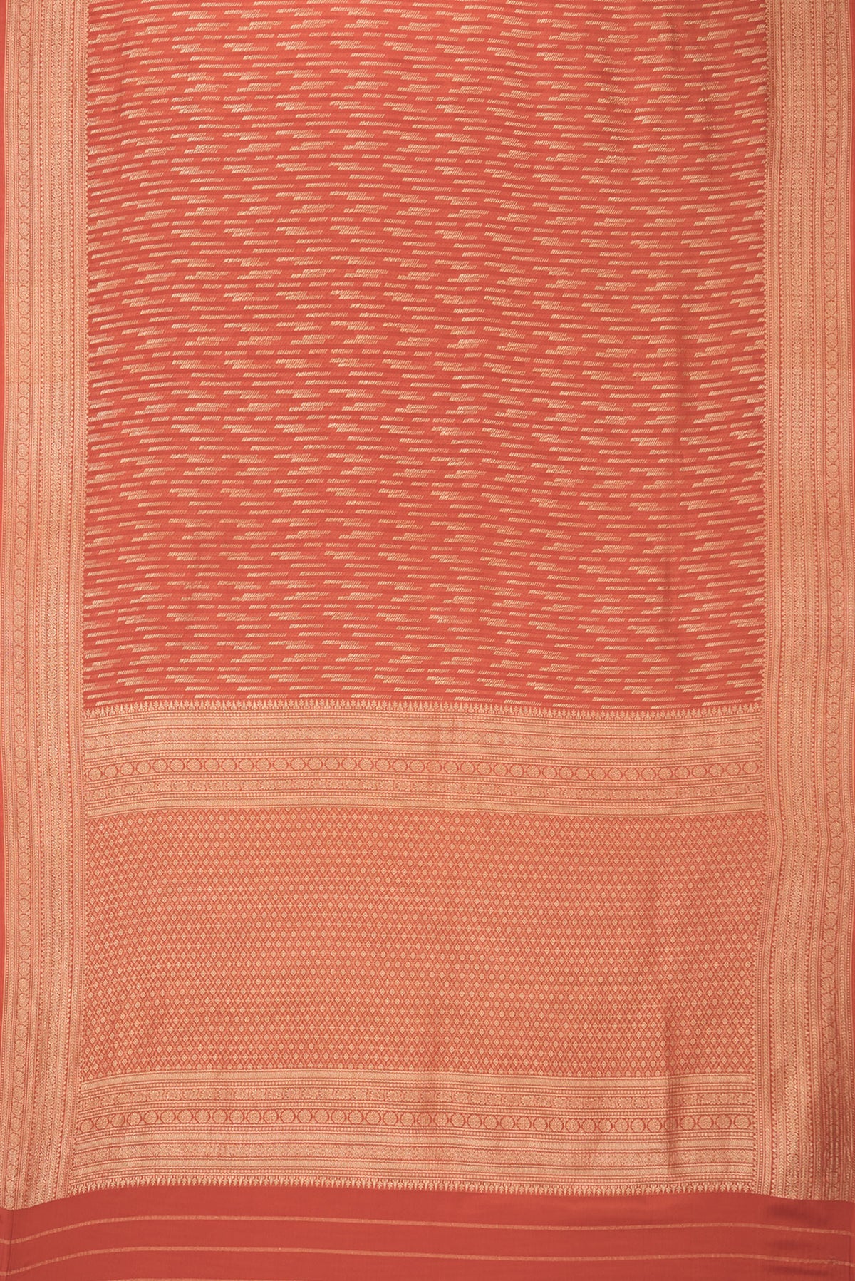 Flat view of Rust Dual Tone Banarasi Georgette Saree with Zari Brocade on the body and Zari Border. 