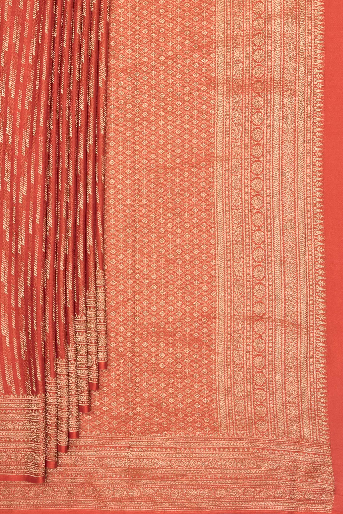 Pleats and pallu of Rust Dual Tone Banarasi Georgette Saree with Zari Brocade on the body and Zari Border. 