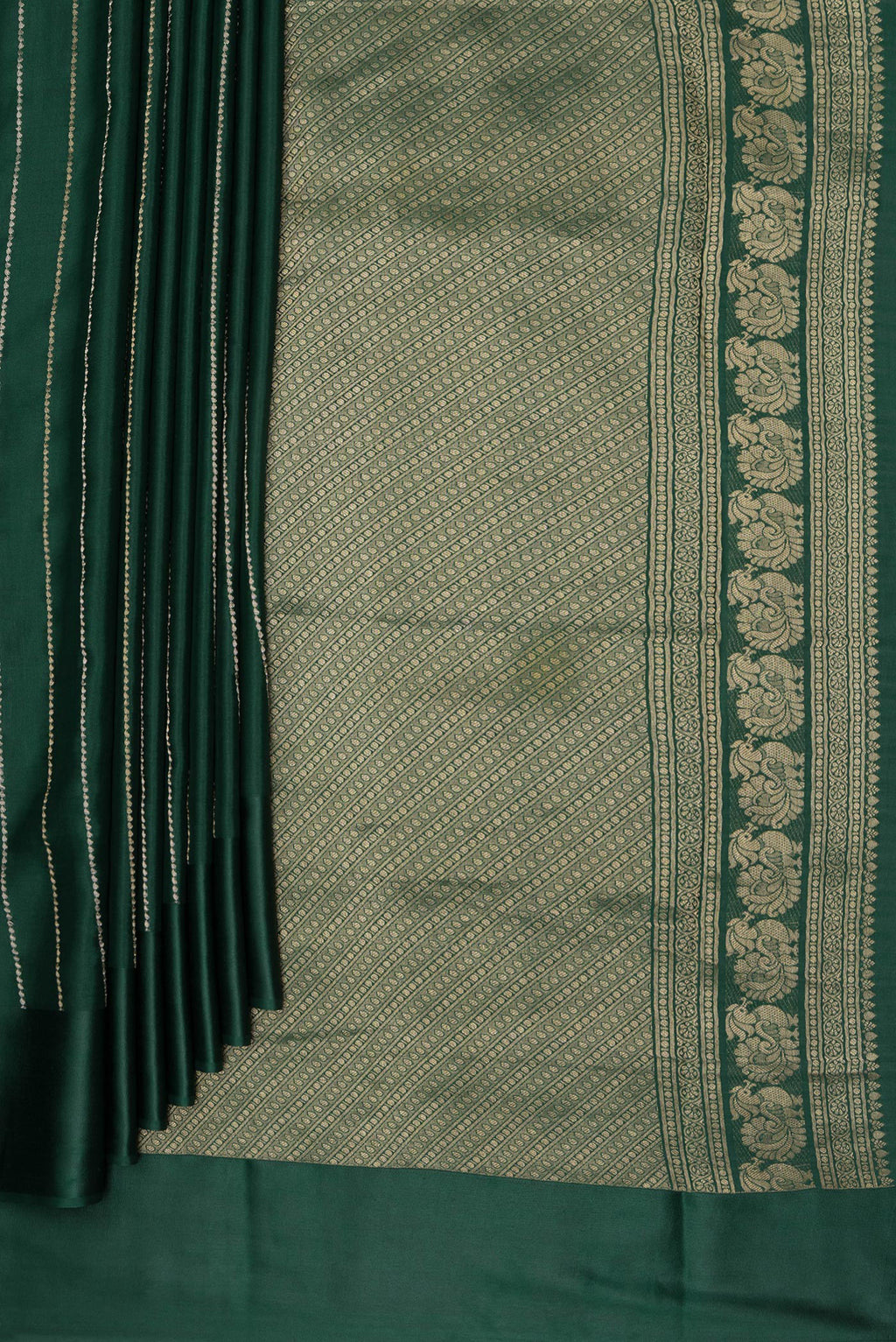 Pleats and pallu of Pure Silk Bottle Green Dual Tone Banarasi Georgette Saree with Stripes on the body and Zari Border. 