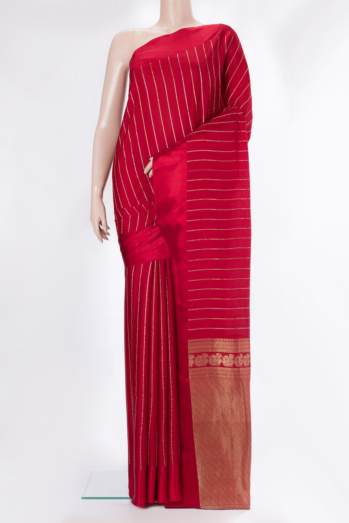 Red Mysore Crepe Saree with Stripes on the body and Plain Border.  displayed on a mannequin