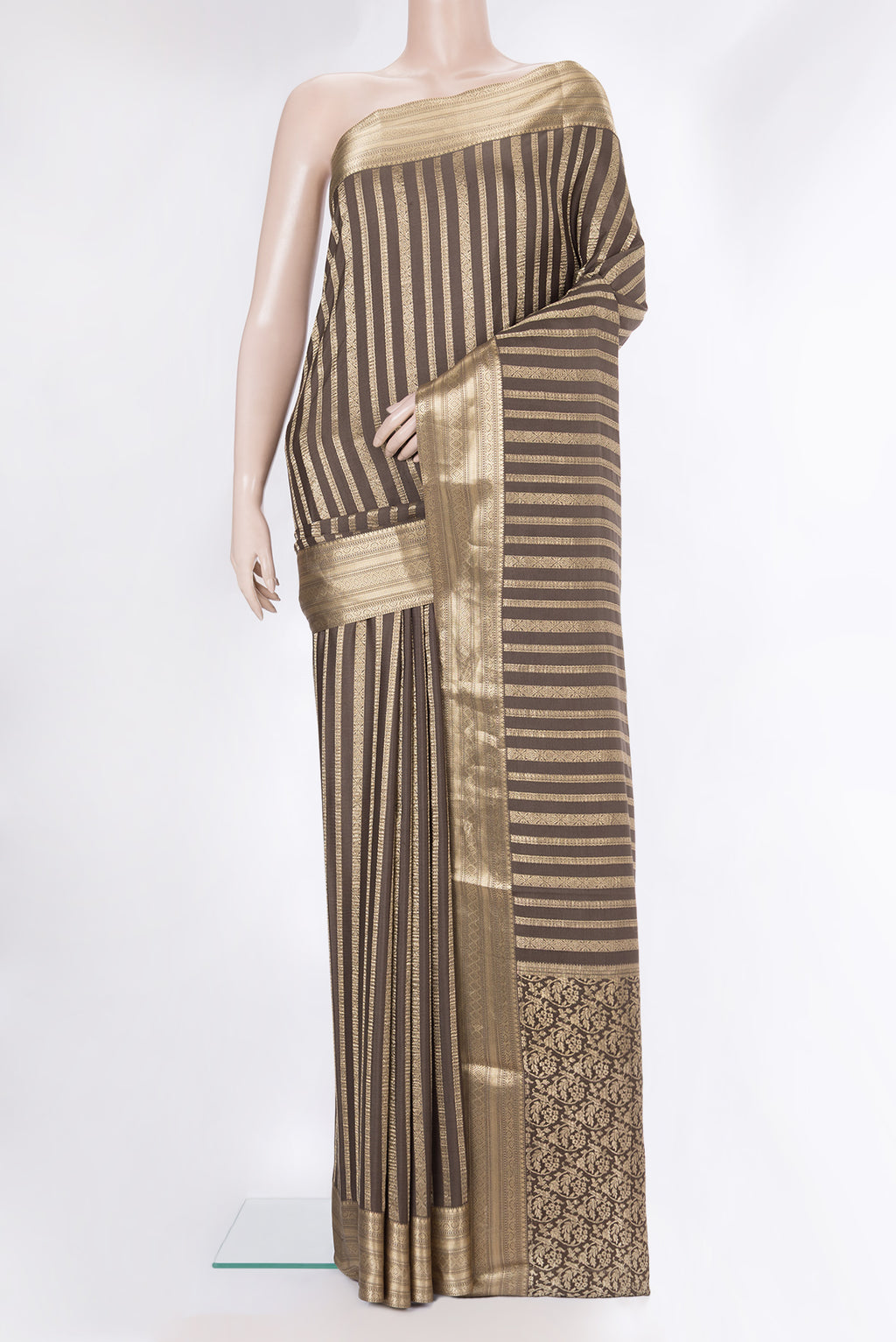 Dark Beige Mysore Crepe Saree with Stripes on the body and Zari Border.  displayed on a mannequin