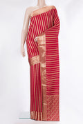 Red Mysore Crepe Saree with Stripes on the body and Zari Border.  displayed on a mannequin