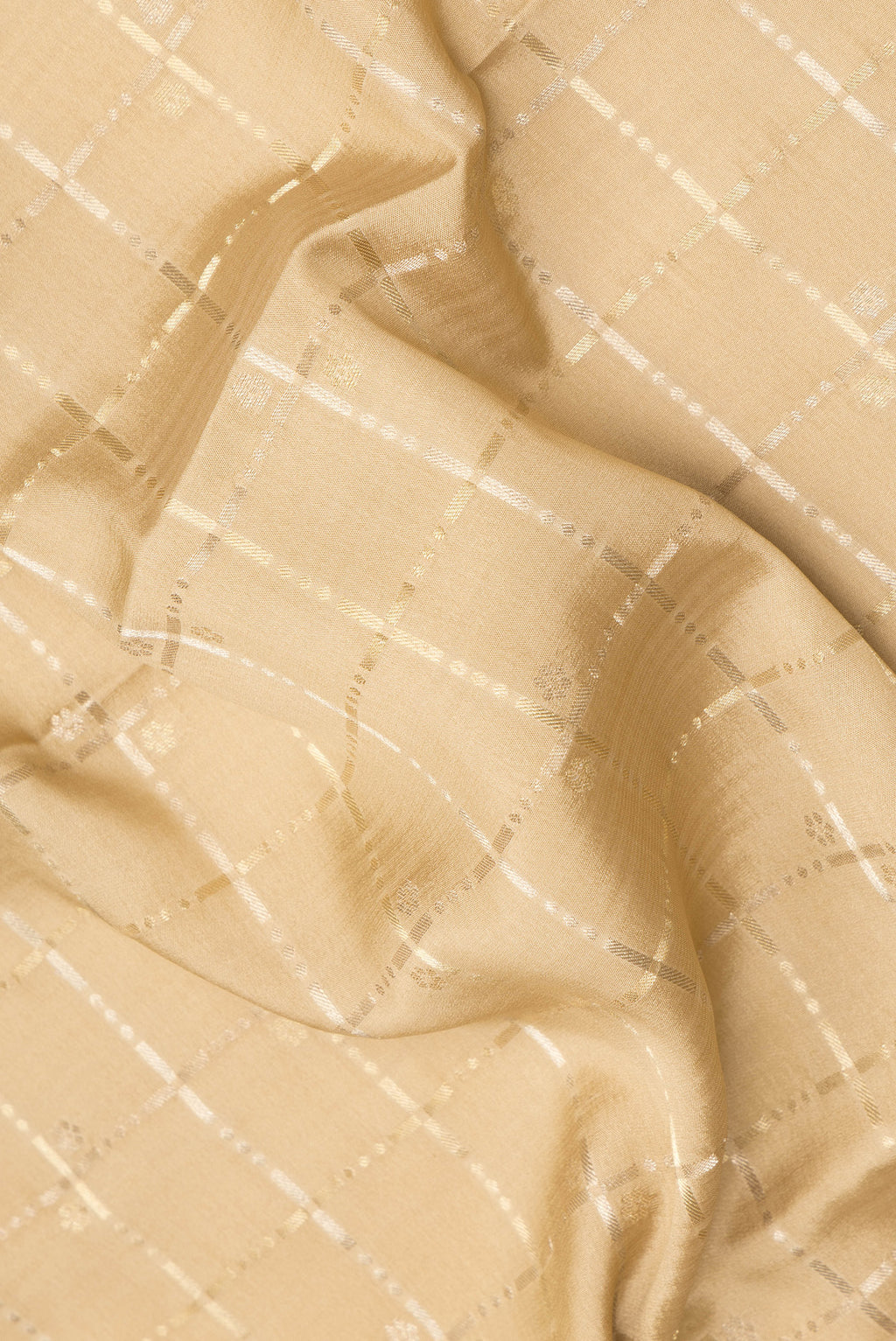 Close up of Beige Dual Tone Banarasi Georgette Saree with Checked design on the body and Zari Border.  displaying folds