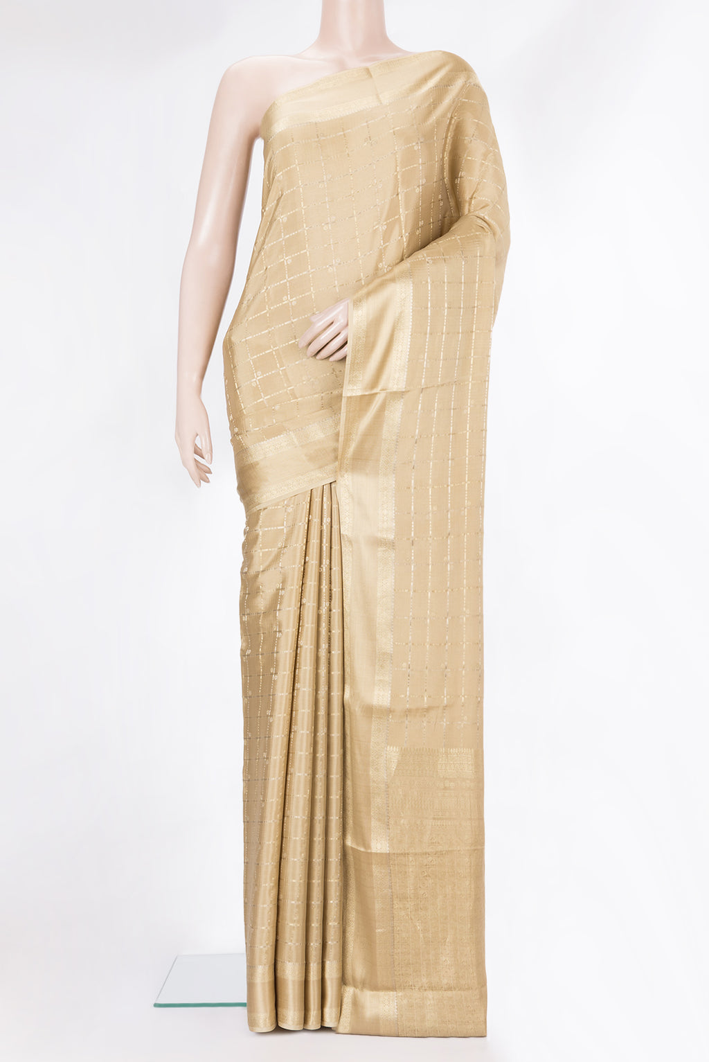 Beige Dual Tone Banarasi Georgette Saree with Checked design on the body and Zari Border.  displayed on a mannequin