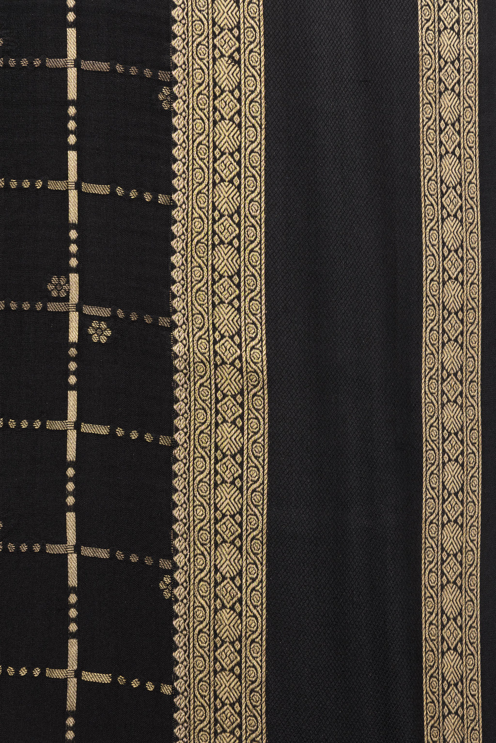 Border image of Black Dual Tone Georgette Saree with Checked design on the body and Zari Border. 