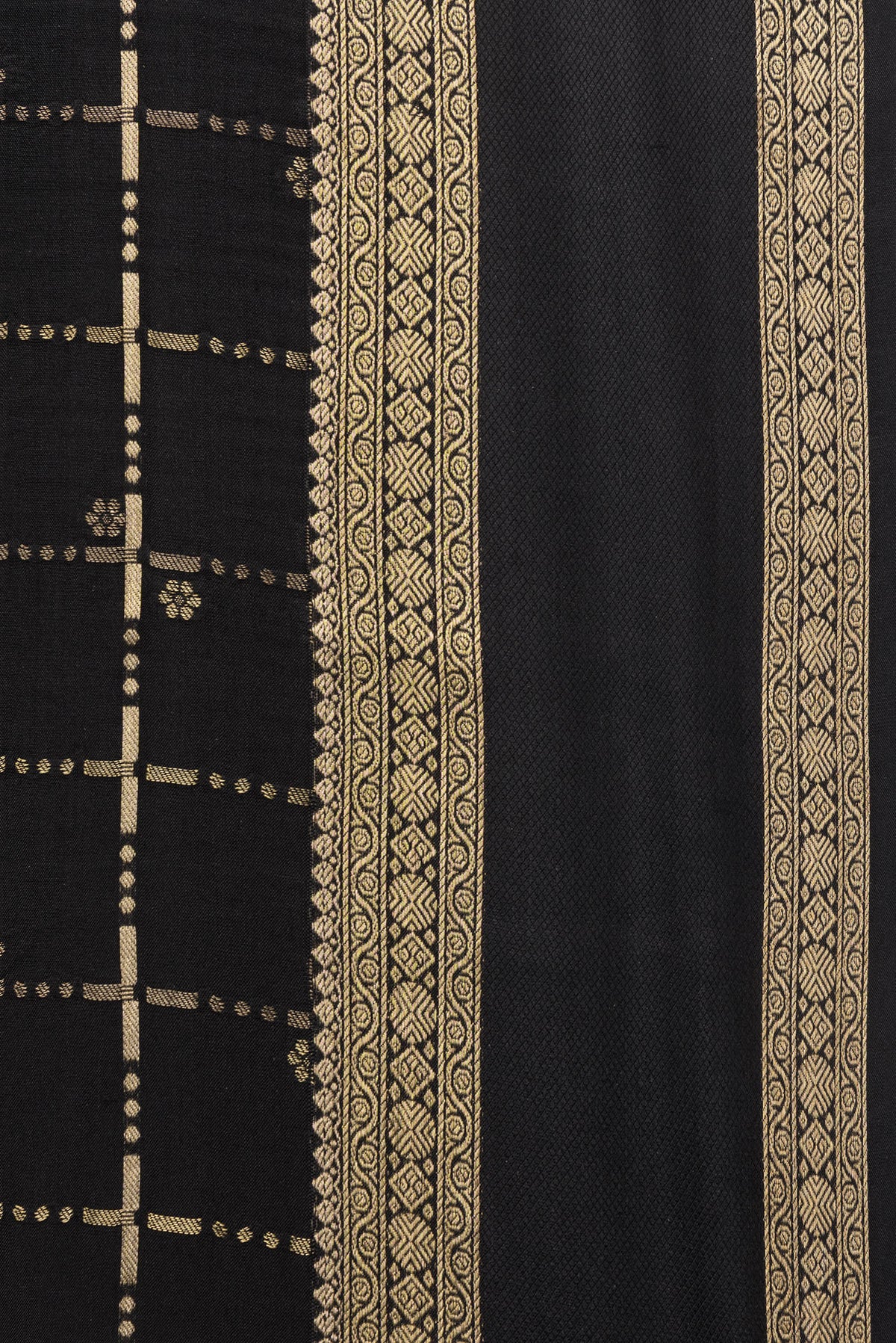Border image of Black Dual Tone Georgette Saree with Checked design on the body and Zari Border. 
