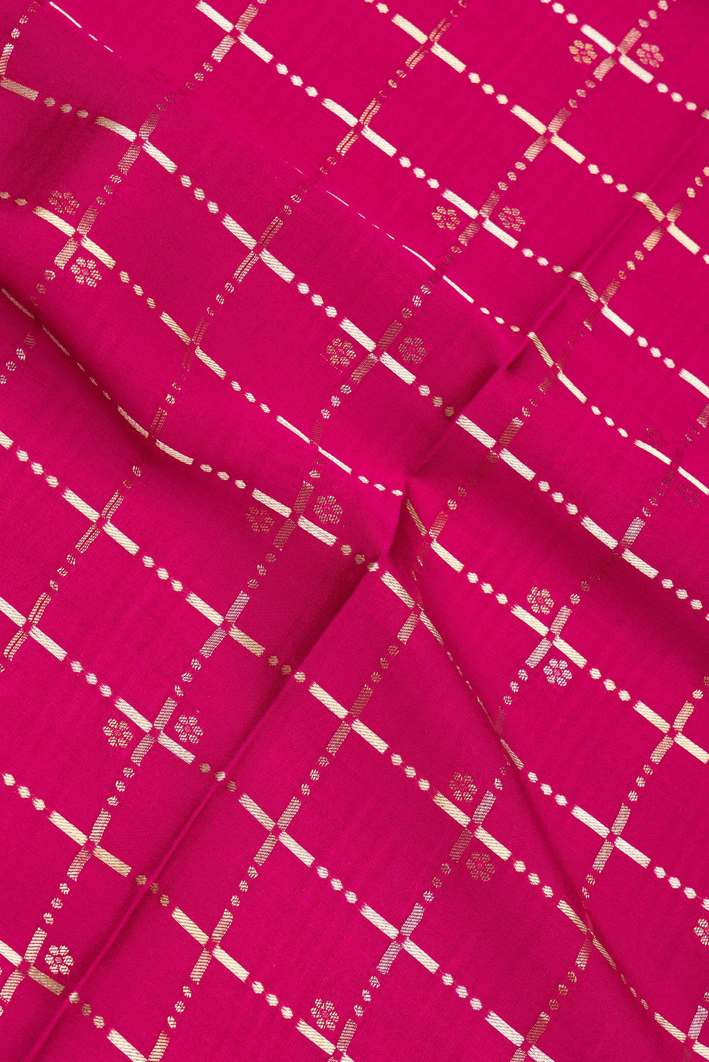 Close up of Magenta Dual Tone Banarasi Georgette Saree with Checked design on the body and Zari Border.  displaying folds