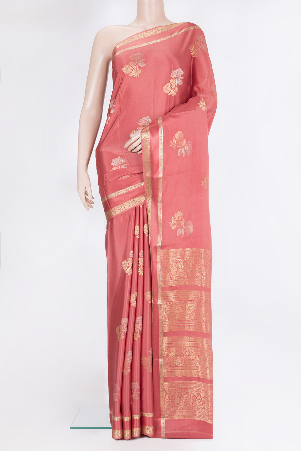 Pink Georgette Saree with Zari Brocade on the body and Zari Border.  displayed on a mannequin