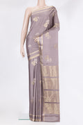 Pure Silk Mauve Dual Tone Banarasi Georgette Saree with Zari Butta on the body and Zari Border.  displayed on a mannequin