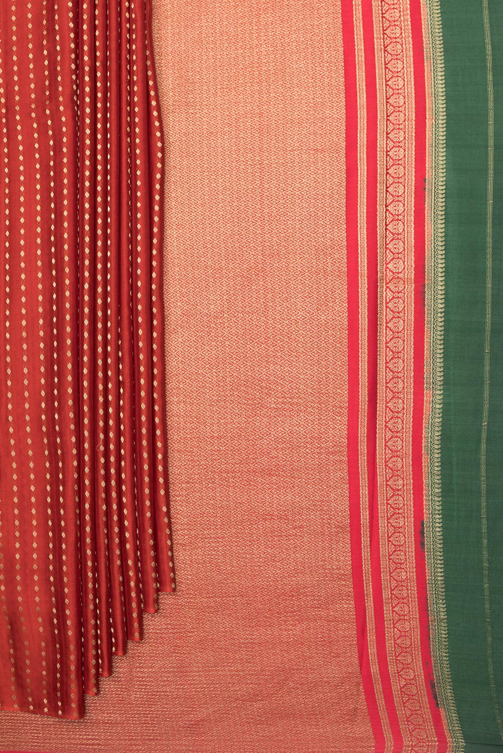 Pleats and pallu of Pure Silk Red Dual Tone Banarasi Georgette Saree with Zari Butta on the body and Without Border. 