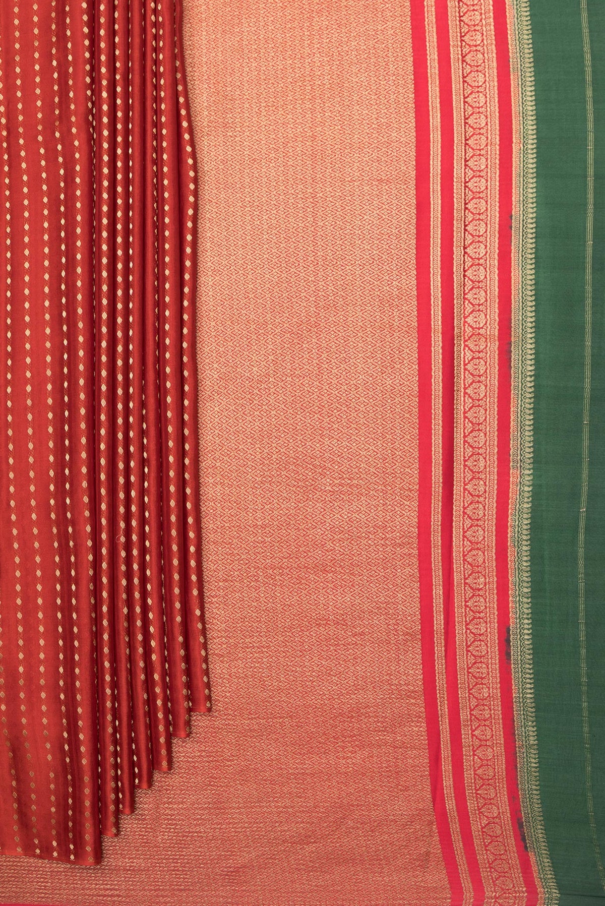 Pleats and pallu of Pure Silk Red Dual Tone Banarasi Georgette Saree with Zari Butta on the body and Without Border. 