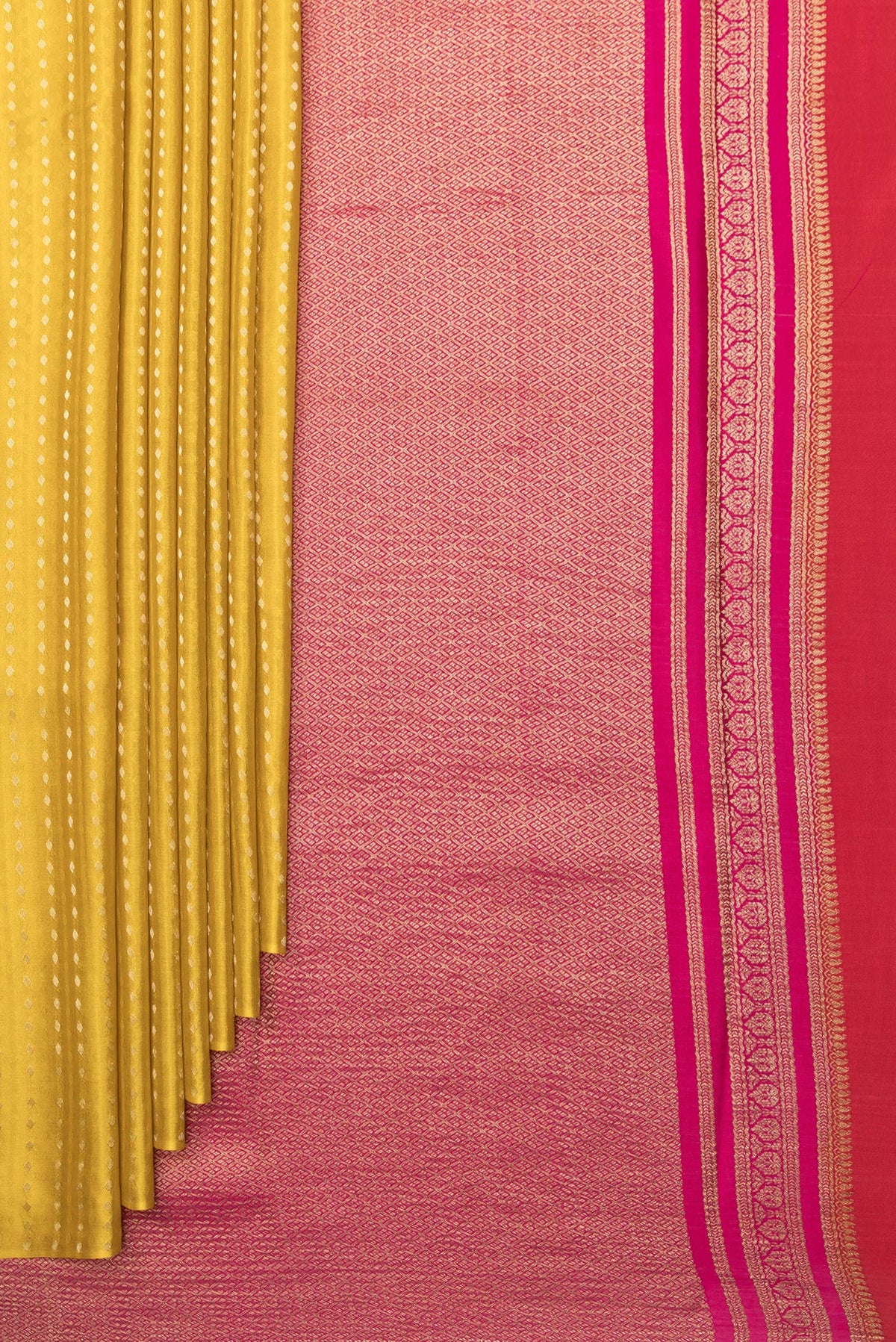 Pleats and pallu of Pure Silk Mustard Dual Tone Banarasi Georgette Saree with Zari Butta on the body and Without Border. 