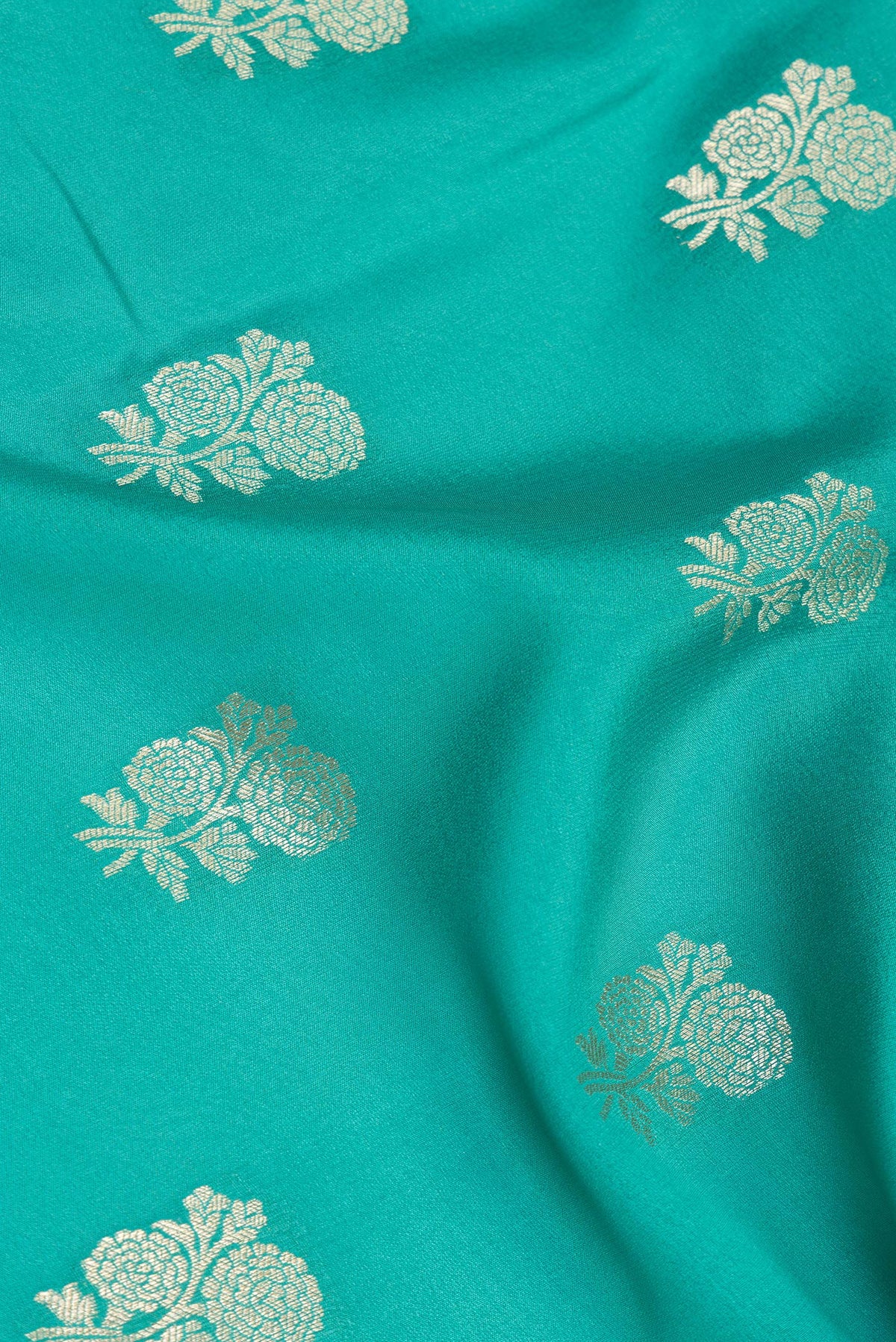 Close up of Pure Silk Sky Blue Dual Tone Banarasi Georgette Saree with Zari Butta on the body and Zari Border.  displaying folds