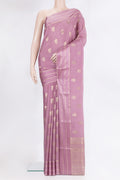 Pure Silk Lilac Dual Tone Banarasi Georgette Saree with Zari Butta on the body and Zari Border.  displayed on a mannequin
