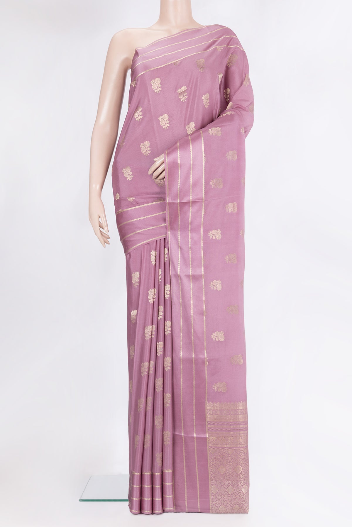 Pure Silk Lilac Dual Tone Banarasi Georgette Saree with Zari Butta on the body and Zari Border.  displayed on a mannequin