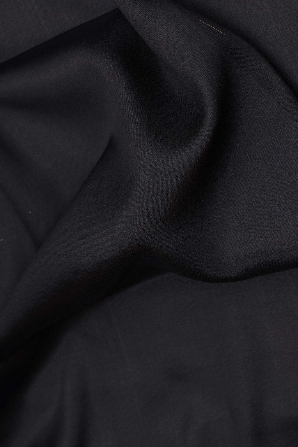 Close up of Pure Silk Coffee Brown Dual Tone Banarasi Georgette Saree with Plain Body and Zari Border.  displaying folds