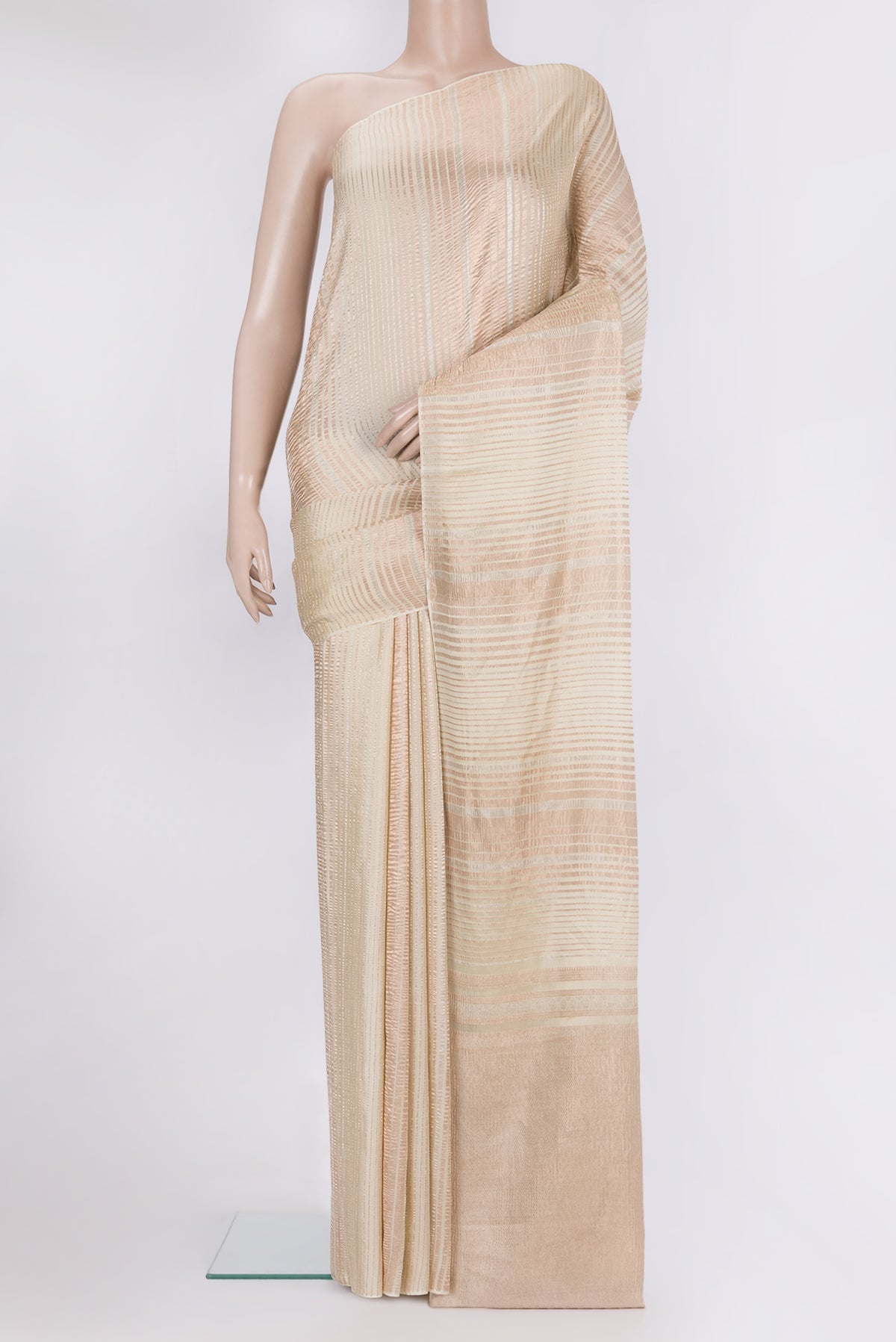 Beige Georgette Saree with Stripes on the body and Without Border.  displayed on a mannequin