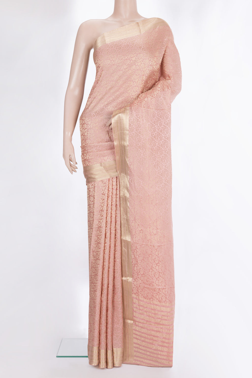 Peach Dual Tone Crepe Saree with Zari Brocade on the body and Zari Border.  displayed on a mannequin
