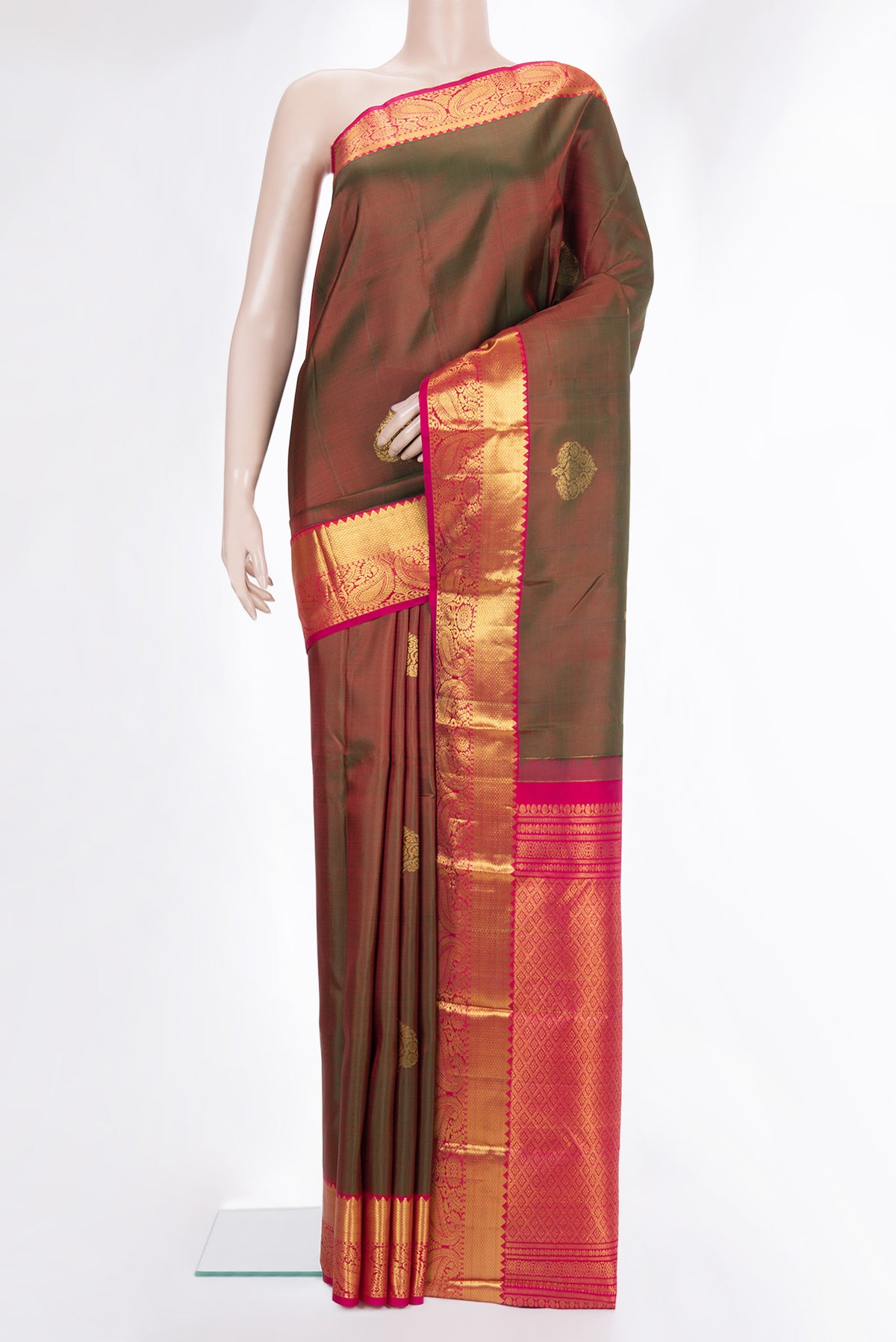 Pure Silk Mehandi Green Dual Tone Kanjivaram Saree with Zari Butta on the body and Zari Border.  displayed on a mannequin