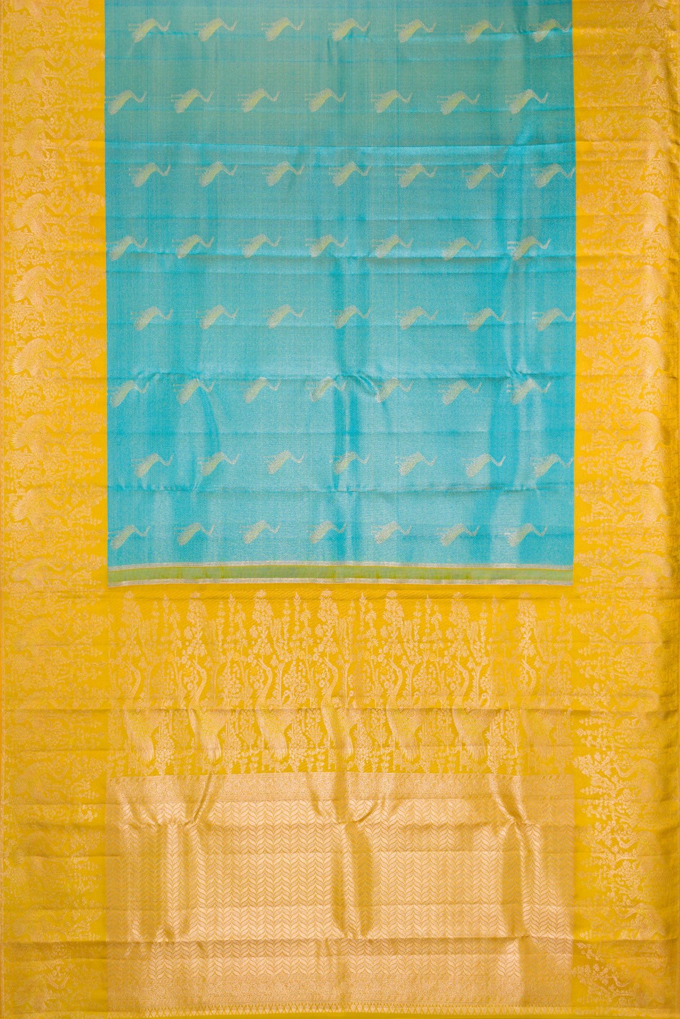 Flat view of Sky Blue Kanchipuram Tissue Silk Saree with Zari Brocade on the body and Fancy Border. 