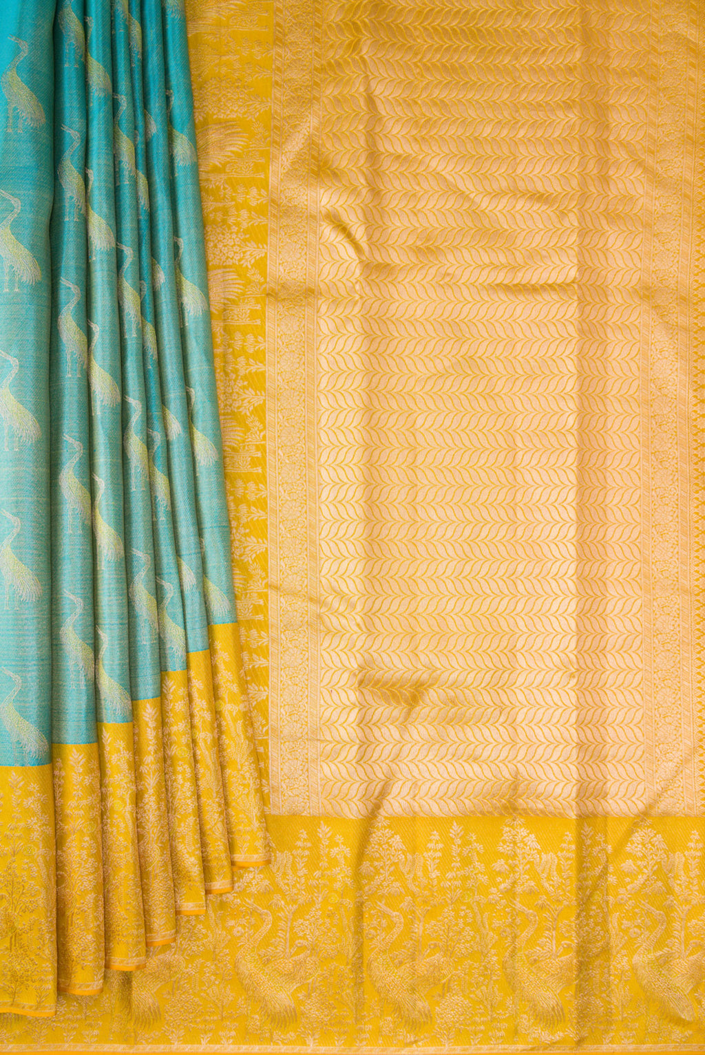 Pleats and pallu of Sky Blue Kanchipuram Tissue Silk Saree with Zari Brocade on the body and Fancy Border. 