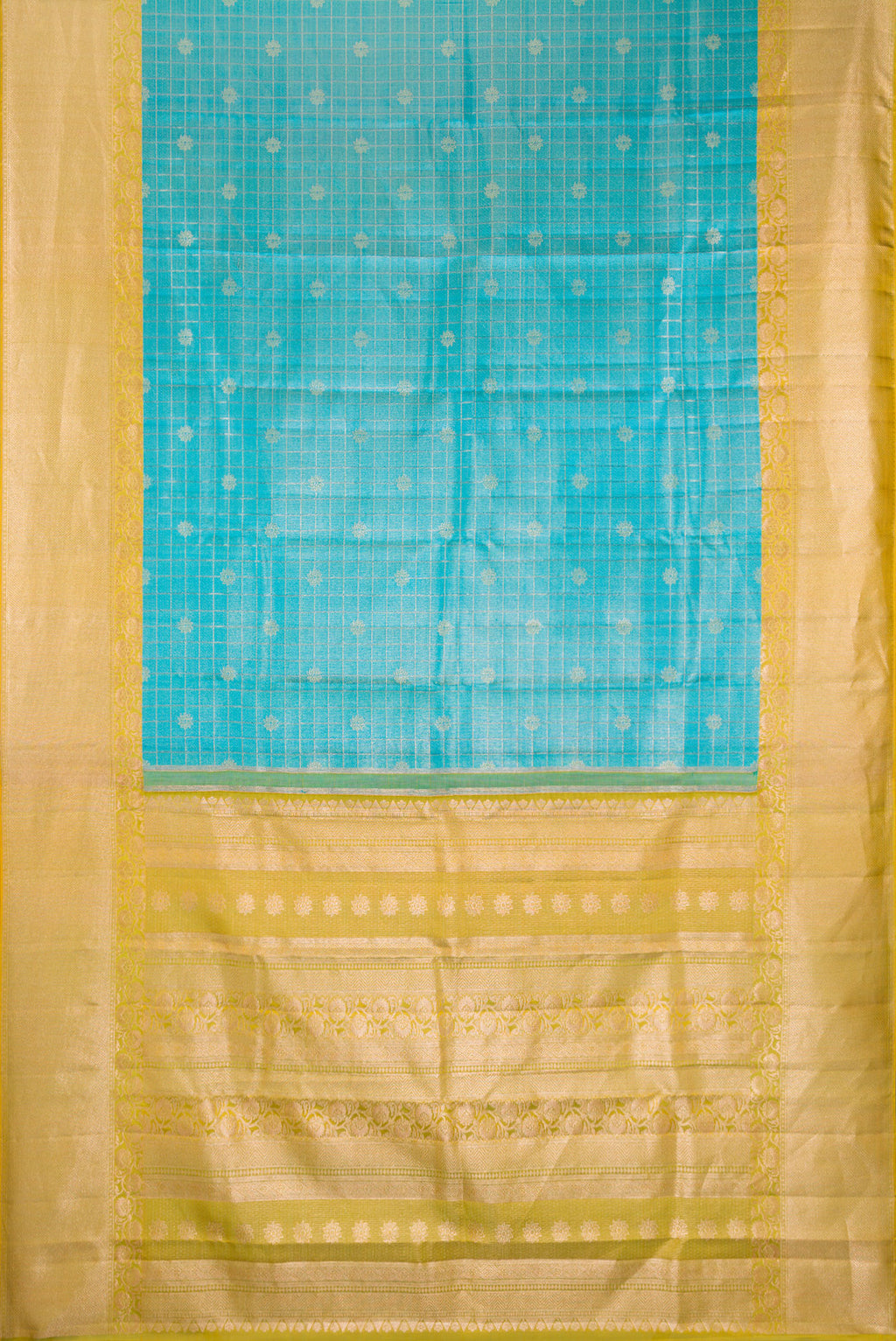 Flat view of Sky Blue Dual Tone Kanchipuram Tissue Silk Saree with Checked design on the body and Fancy Border. 