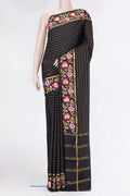 Black Mysore Silk Saree with Stripes on the body and Fancy Border.  displayed on a mannequin