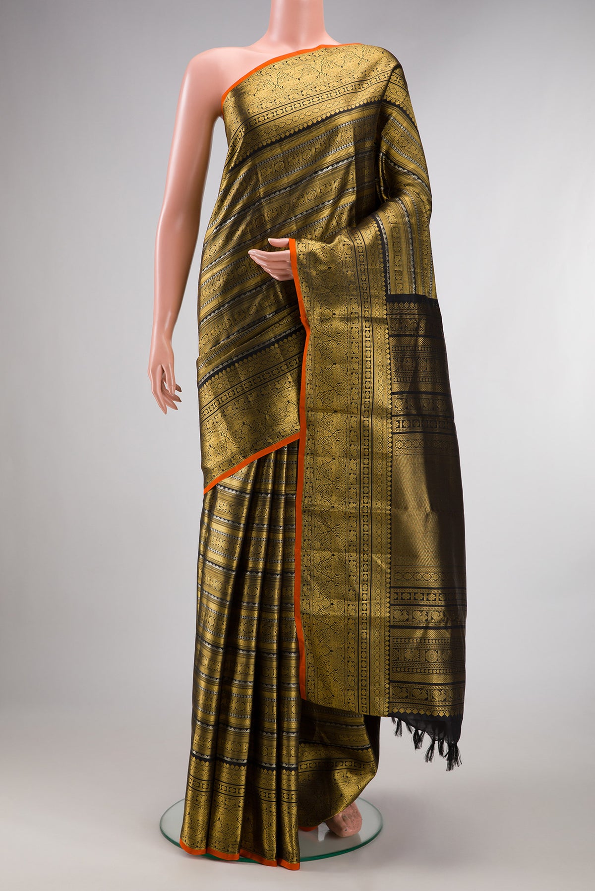 Pure Silk Black Kanchipuram Saree with Zari Brocade on the body and Fancy Border.  displayed on a mannequin