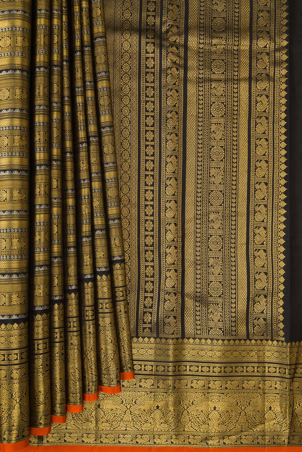 Pleats and pallu of Pure Silk Black Kanchipuram Saree with Zari Brocade on the body and Fancy Border. 