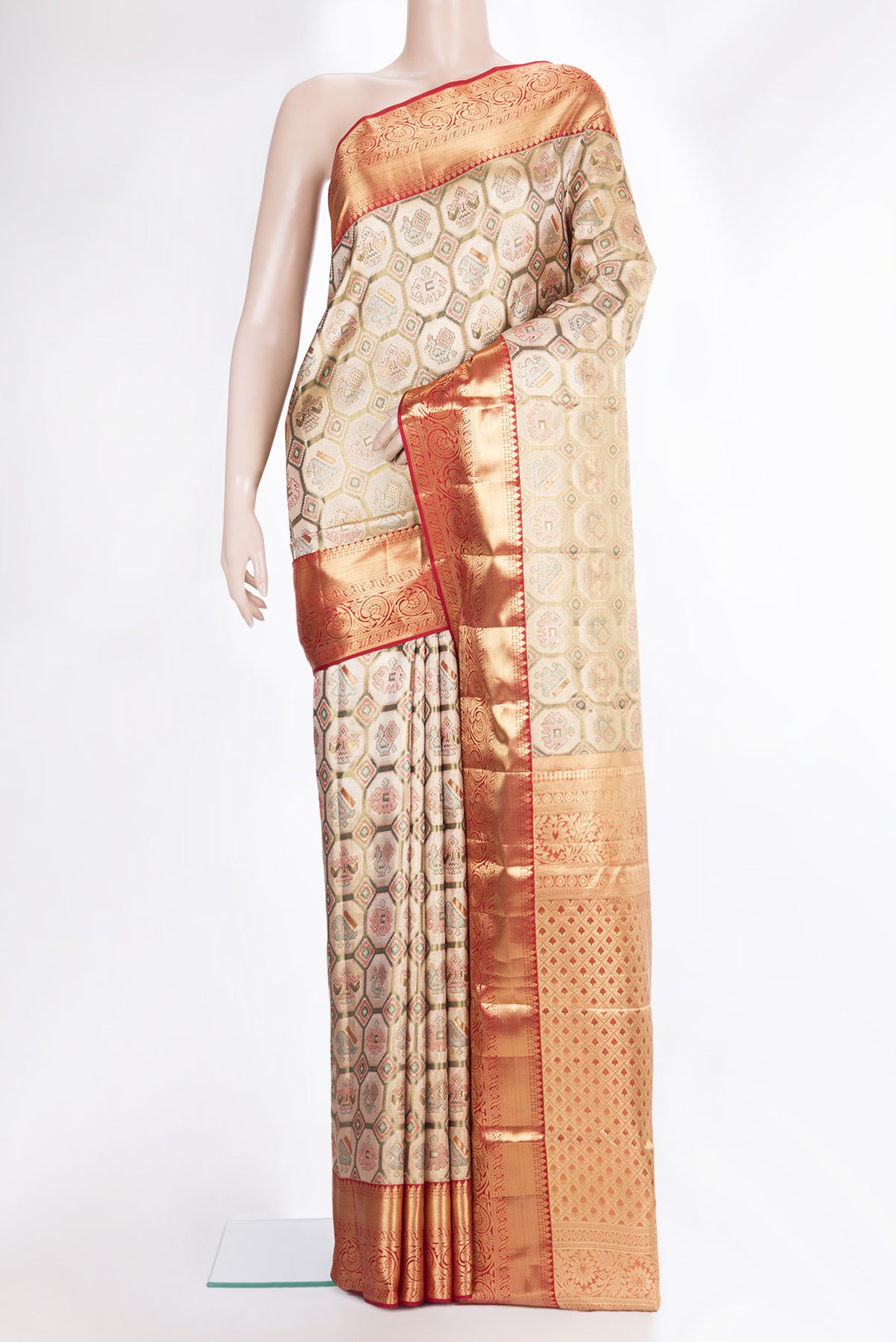 Pure Silk Gold Dual Tone Kanjivaram Tissue Saree with Zari Brocade on the body and Fancy Border.  displayed on a mannequin