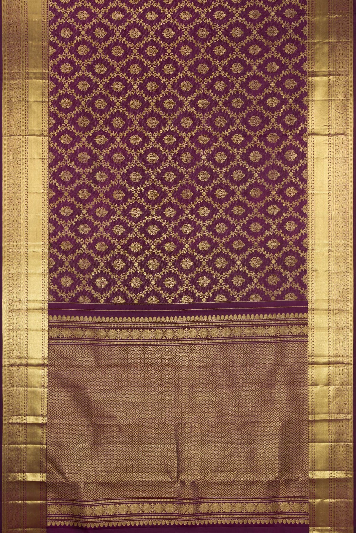 Flat view of Burgundy Kanjivaram Silk Saree with Zari Brocade on the body and Zari Border. 