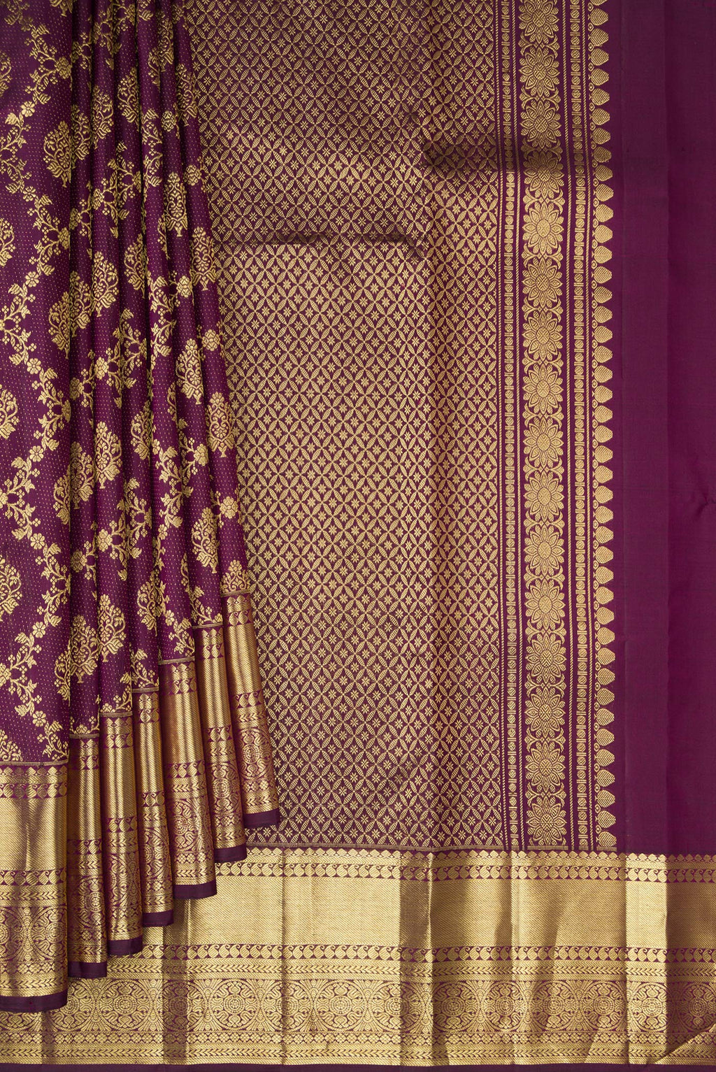Pleats and pallu of Burgundy Kanjivaram Silk Saree with Zari Brocade on the body and Zari Border. 