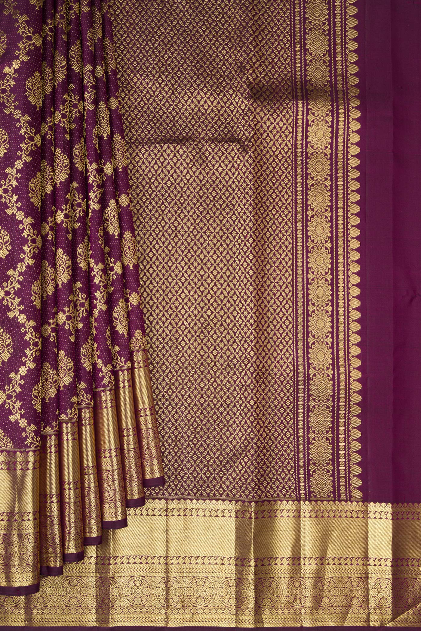 Pleats and pallu of Burgundy Kanjivaram Silk Saree with Zari Brocade on the body and Zari Border. 
