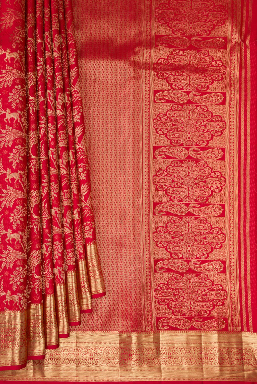 Pleats and pallu of Red Kanjivaram Silk Saree with Zari Brocade on the body and Zari Border. 