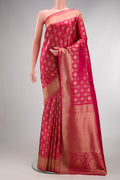 Pure Silk Dark Pink Kanjivaram Saree with Zari Brocade on the body and Zari Border.  displayed on a mannequin