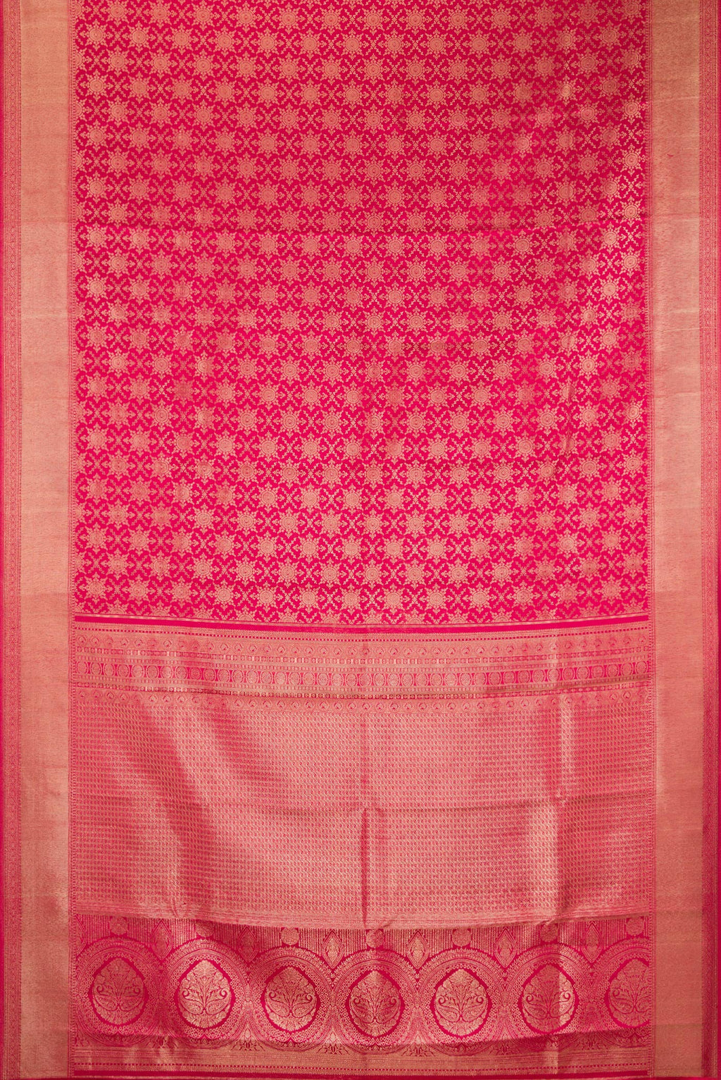 Flat view of Pure Silk Dark Pink Kanjivaram Saree with Zari Brocade on the body and Zari Border. 