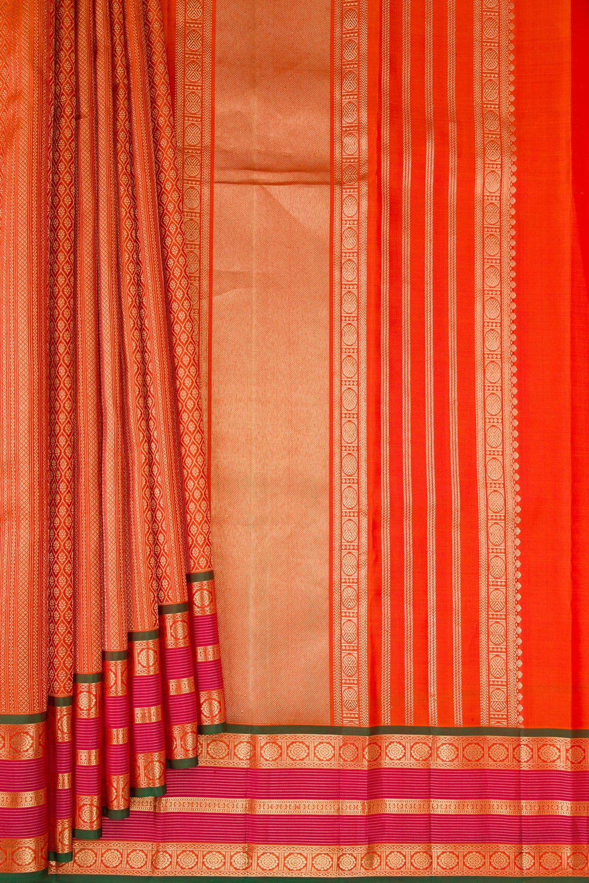 Pleats and pallu of Pure Silk Mustard Dual Tone Kanjivaram Saree with Zari Brocade on the body and Zari Border. 