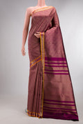 Pure Silk Magenta Kanjivaram Saree with Zari Brocade on the body and Zari Border.  displayed on a mannequin