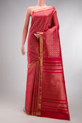 Dark Pink Kanjivaram Silk Saree with Zari Brocade on the body and Zari Border.  displayed on a mannequin