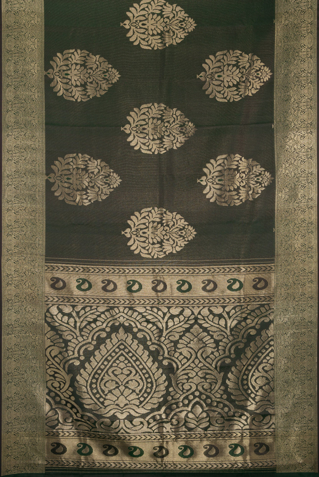 Flat view of Bottle Green Kanjivaram Silk Saree with Zari Brocade on the body and Fancy Border. 