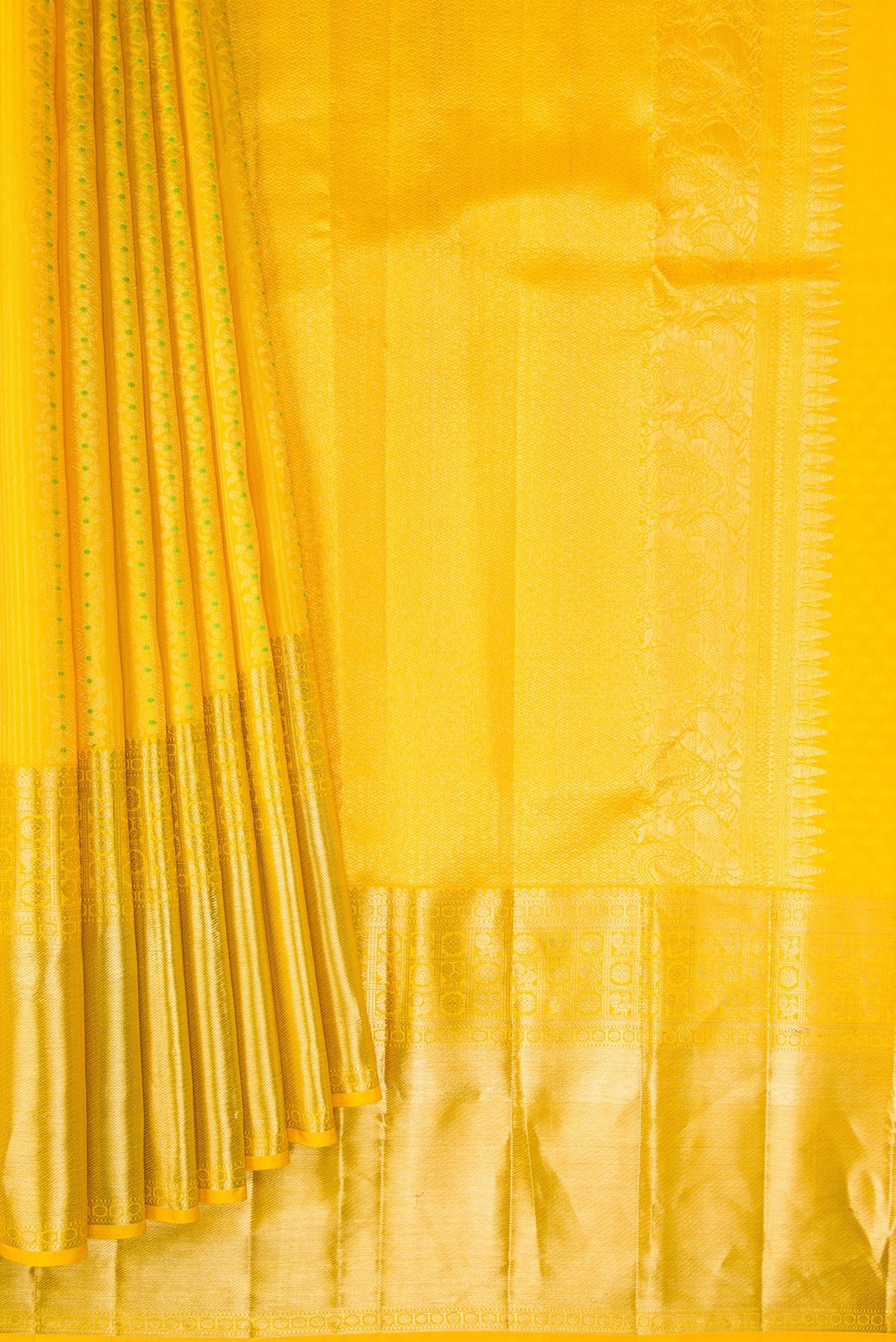Pleats and pallu of Pure Silk Yellow Kanjivaram Saree with Stripes on the body and Zari Border. 