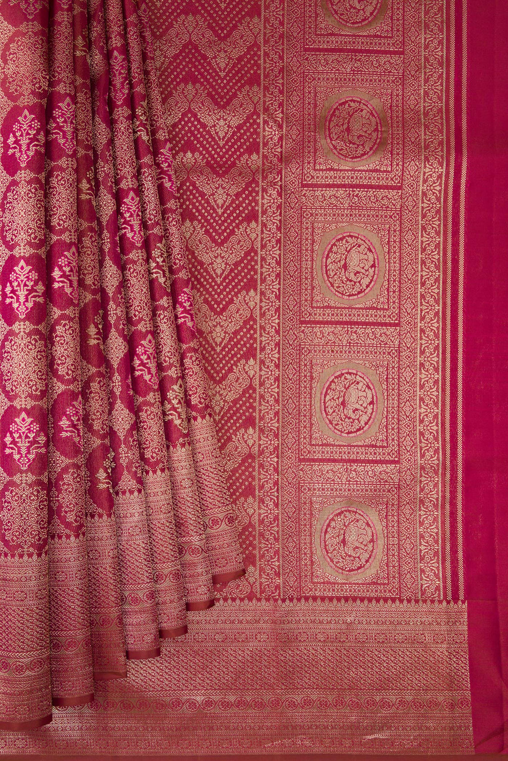 Pleats and pallu of Maroon Kanjivaram Silk Saree with Zari Brocade on the body and Fancy Border. 