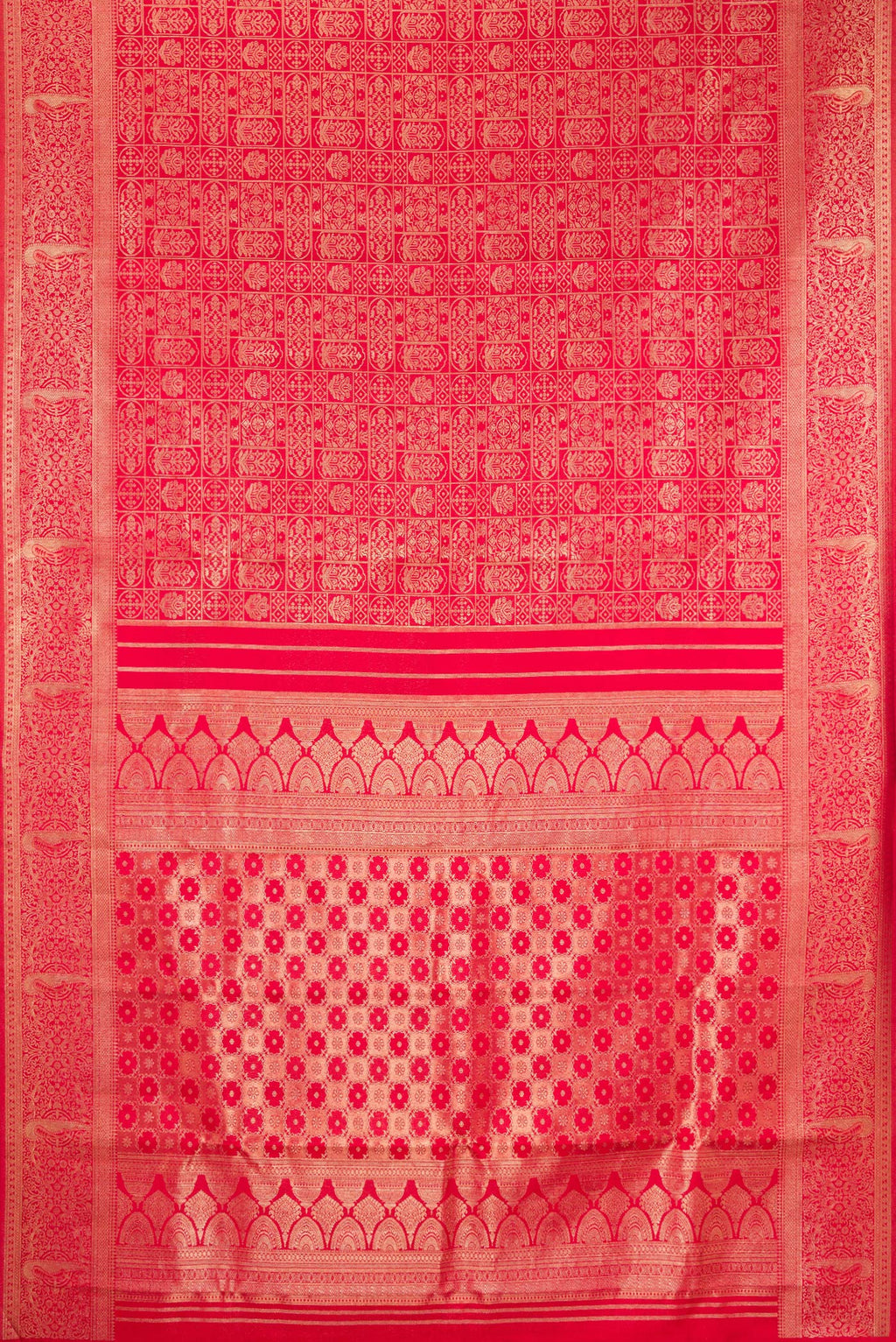 Flat view of Red Kanjivaram Silk Saree with Zari Brocade on the body and Fancy Border. 