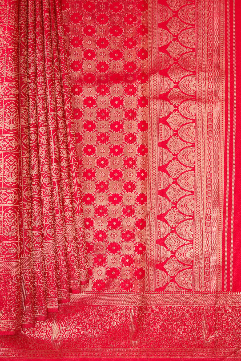Pleats and pallu of Red Kanjivaram Silk Saree with Zari Brocade on the body and Fancy Border. 